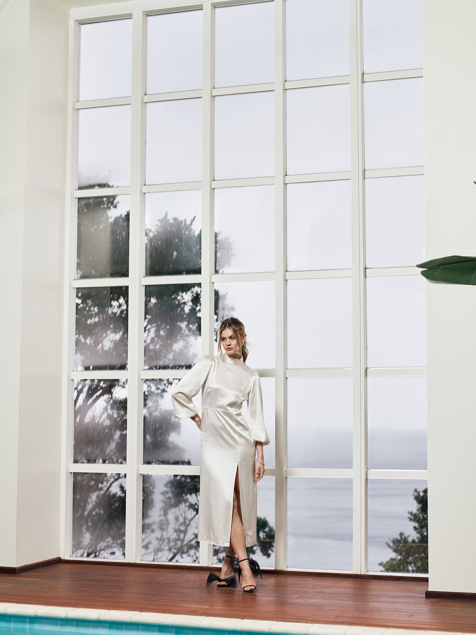 MODEL JORDAN SIMEK WEARING MERA SILK HERA DRESS IN IVORY